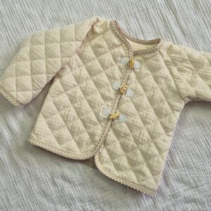 Jasje hydrofiel gequilt beige kant